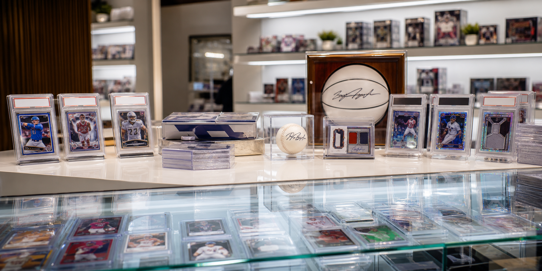 Premium sports cards and memorabilia in a display case